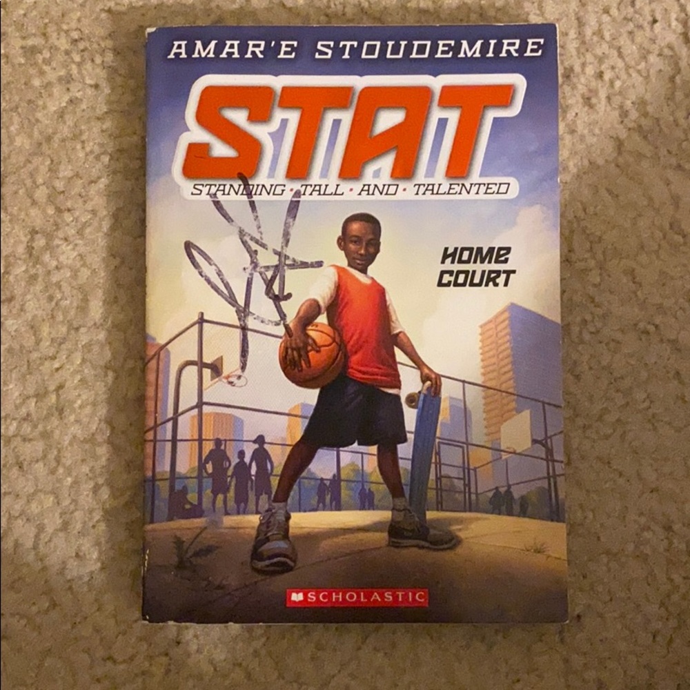 Signed STAT Book by NBA Star Amar’e Stoudemire